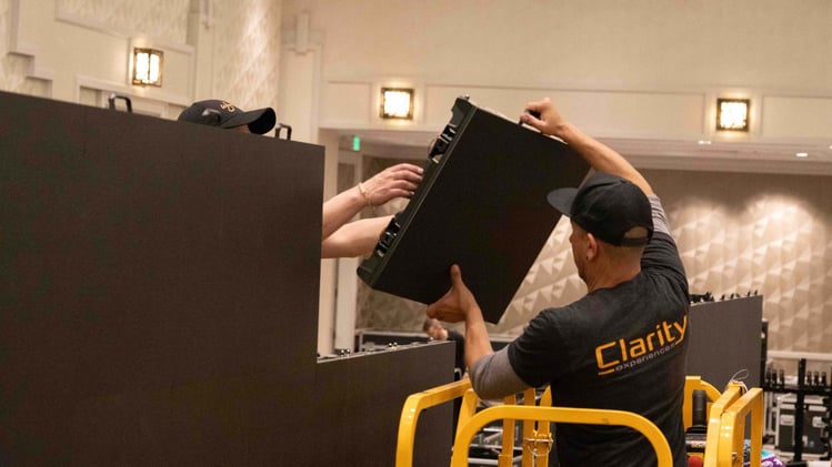 AV Technician Setting Up LED Wall Tiles